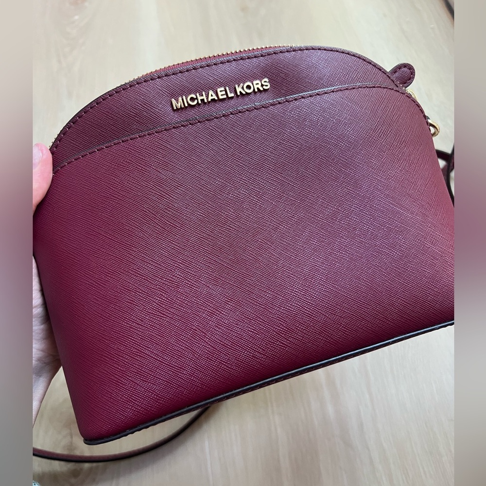 Micheal Kors crossbody purse.Burgundy.